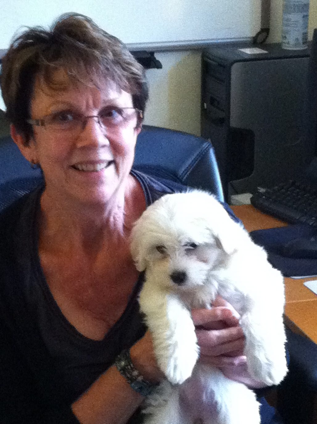 Sandy Dochnahl holding a little dog